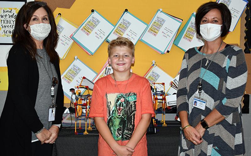 West Fannin Elementary School fifth grade student Brody Graham was one of six elementary school students from across the state to participate in the Georgia Department of Education’s virtual STEM/STEAM panel series Tuesday, October 13. Shown are, from left, STEM teacher Kim Patterson, Graham and Principal Alison Danner.