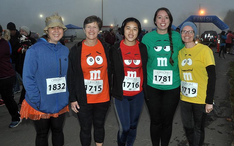 Runners braved the chilly weather and competed in the Bigfoot Boogie 5K Saturday, October 31. Shown before the race are, from left, Tobi Chandler, Mary Murphy, Faith Murphy, Haley Chastain and Bri-Ann Mary.