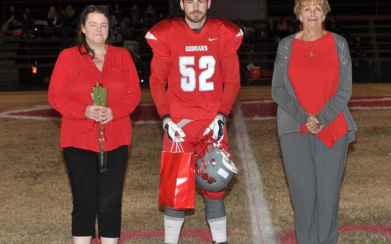 Copper Basin honored it’s seniors before the Cougars football game against Clay County Friday, November 6. Football senior Larry Dye is shown escorted by his mother Susan Dye and grandmother Sheila Ownby.
