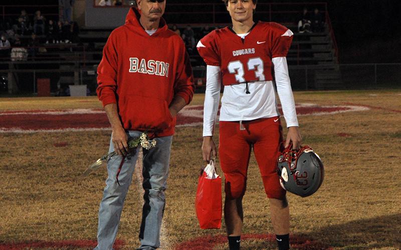 Senior football player Timothy Fair was honored during Copper Basin’s senior night ceremony Friday, November 6. Fair is shown with his father, Scott Fair.