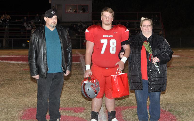 Copper Basin honored its football seniors Friday, November 6, before their last home game against Clay County. Senior football player Hunter Perry is shown with his parents, Scott and Lisa Perry.