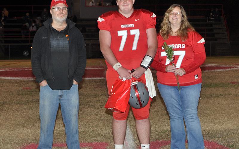 Copper Basin honored its football seniors Friday, November 6, before their last home game against Clay County. Senior football player Dawson Worthy is shown with his parents Tim and Alicia Worthy.