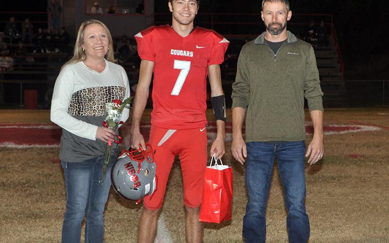 Copper Basin honored its football seniors Friday, November 6, before their last home game against Clay County. Senior football player Chance Rollins is shown with his parents Tony and Amanda Rollins.