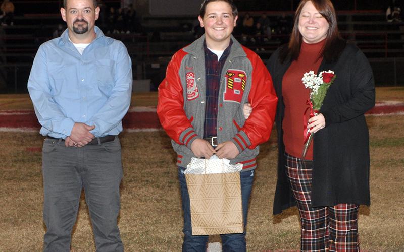 The Copper Basin Cougars honored it’s band, golf, cheerleader and football seniors Friday, November 6. Senior golf member Jacob Smith is escorted by Jeremy Smith and Andrea Dalton.