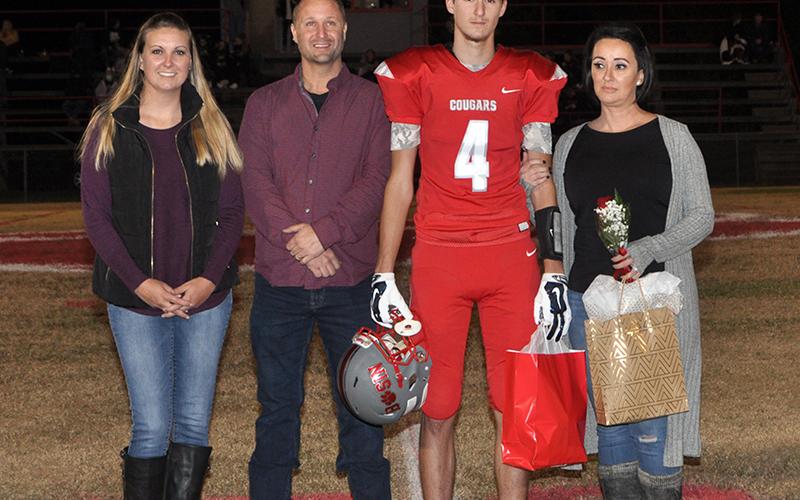 Senior Cougar football player Austin Collis was honored during senior night at Copper Basin High School Friday, November 6. Shown are, from left, Laura Collis, Jason Collis, Austin Collis and Kristin Kincaid