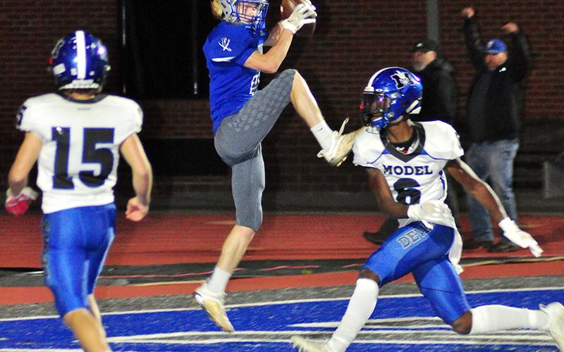 Rebel Cohutta Hyde (4) pulls down a touchdown pass from Luke Holloway in Fannin’s 42-7 win over Model Friday, October 30.