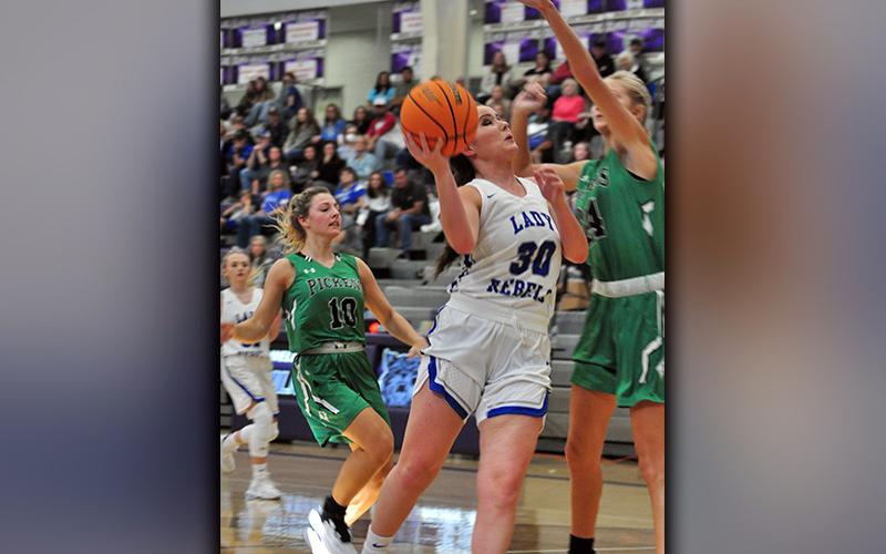 Natalie Thomas goes up for a contested layup during the Lady Rebels game against Pickens County Saturday, November 21.