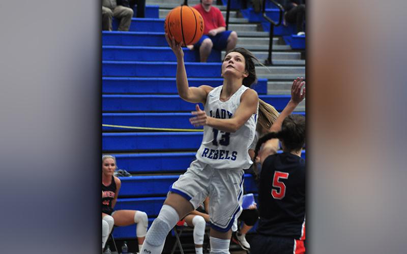 Becca Ledford goes up for a layup during the Lady Rebels’ preseason basketball game with the Habersham Lady Raiders  Thursday, November 12.