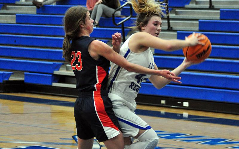 Lady Rebel Olivia Sisson fights through contact during Fannin’s game with Habersham Thursday, November 12.