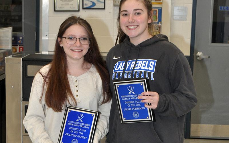 Emmaline Cochran, left, won the Defensive Player of The Year Award for junior varsity, while Paige Foresman won the Defensive Player of The Year Award during the Lady Rebels end of the season volleyball banquet Tuesday, November 10.