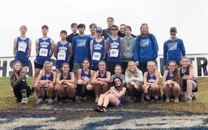 The Fannin Rebel and Lady Rebel cross country teams ran in the state cross country meet in Carrollton, Georgia, Saturday, November 7. Shown following the state meet are, from left, front, Monica Cosentino holding Boone the dog; middle row, Erin Jones, Hannah Sosebee, Taylor Poland, Kristin Cipich, Kinsley Sullivan, Taber Pass, Teagan Cioffi, Carlee Holloway, Olivia Temples and Shaylee Jones; and back row, Jacob Keppal, Jake Jones, Zechariah Prater, Phoenix Leifer, Daniel Espinosa Garcia, James Kyle, Luke Ca