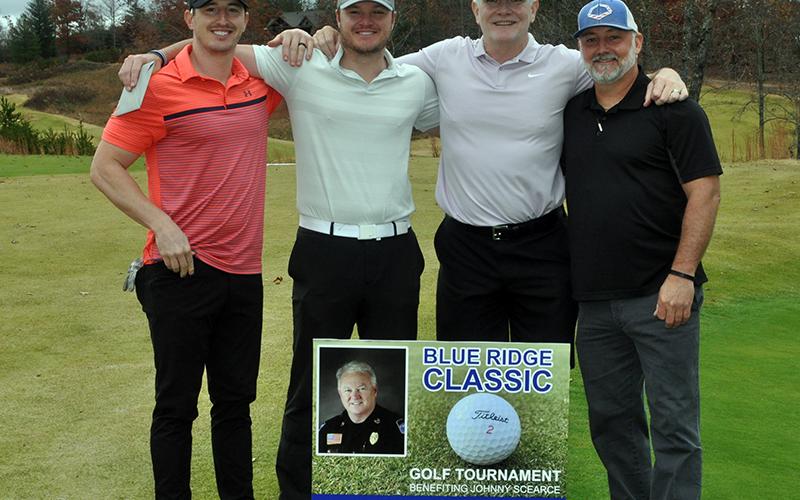 Golfers Chad Scearce, Shawn Scearce, Mike Scearce and Robert Mask get ready to compete in the Blue Ridge Classic Scramble Tuesday, November 10.