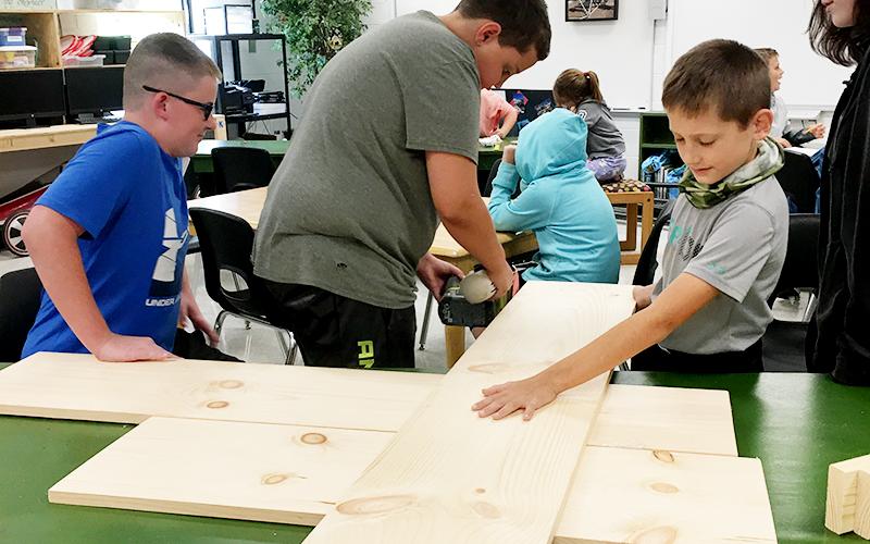 Fifth grade students at Blue Ridge Elementary School helped build and assemble the new Bears Farm and Arts Mini Famer’s Market. Shown are, from left, Cale Weeks, Gabe Partin, Kole Stanley and Riley Ledford.