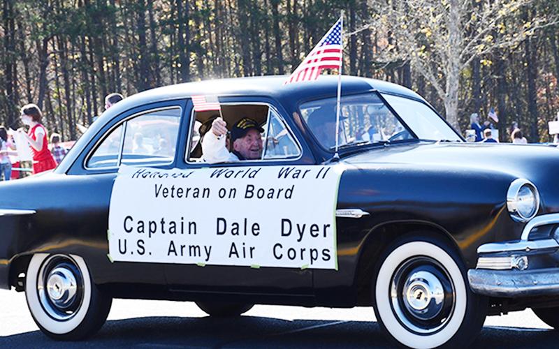 World War II Army Veteran Dale Dyer excitedly waved to the students, faculty and staff of Fannin County Middle School during the school’s drive-thru Veterans’ Day Parade Friday, November 6.