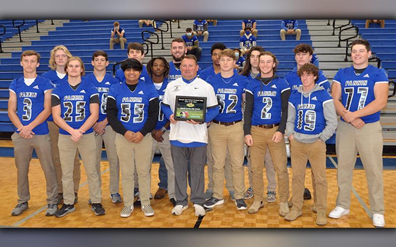 The Fannin County Rebel football team was recognized for the Georgia High School Football Daily’s (GHSFD) State Team of the Week Award Wednesday, December 9. Seniors gathered with Rebel Head Coach Chad Cheatham to celebrate the recognition. Shown, from left, front, McCay Turner, James Mercer, Christian Resendiz, coach Cheatham, Micah O’Neal, Jake Sands and Caleb Postell; back row,  Dalton Ross, Brayden Foster, Tommy Ledford, Andre Bivens, Mason Bundy, Jalen Ingram, Luke Holloway, junior Seth Reece and Chris
