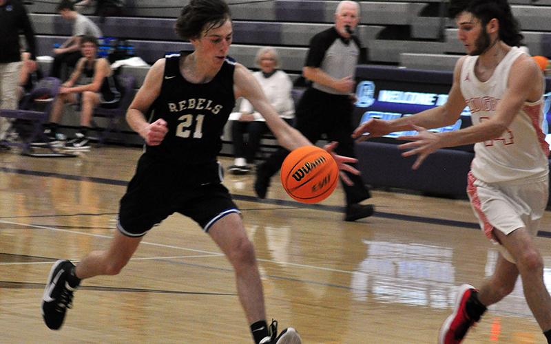 Fannin Rebel Nick Arp (21) stops a Copper Basin fast break during the Rebels and Cougars game Tuesday, November 24.