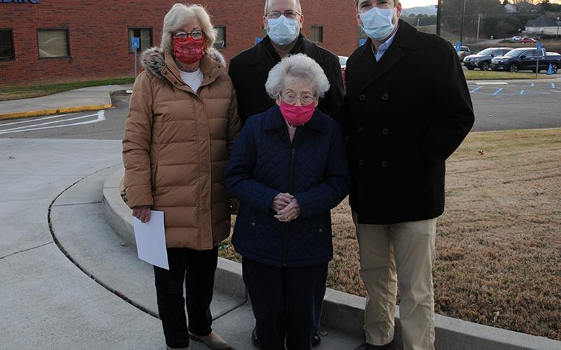 Sarah Lanning, a veteran member of the Fannin Regional Hospital Auxiliary, was not stopped in her determination to attend the annual Love Light Tree ceremony. Lanning, front, is shown with, from left, Lanning’s daughter, Becky Guthrie, Chief Financial Officer Geoff Blomeley and Chief Executive Officer Jason Jones.