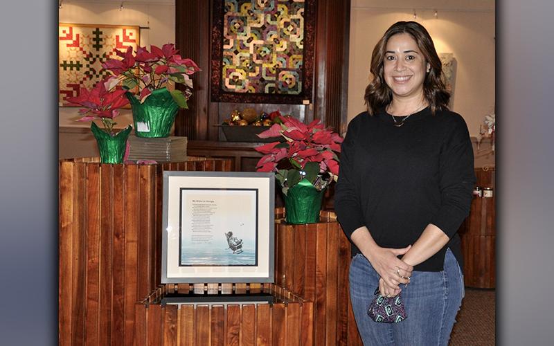Blue Ridge Mountains Arts Association (BRMAA) Executive Director Nichole Potzauf stands proudly beside a hard-earned Governor’s Award for the Arts and Humanities, which BRMAA had the honor to accept.