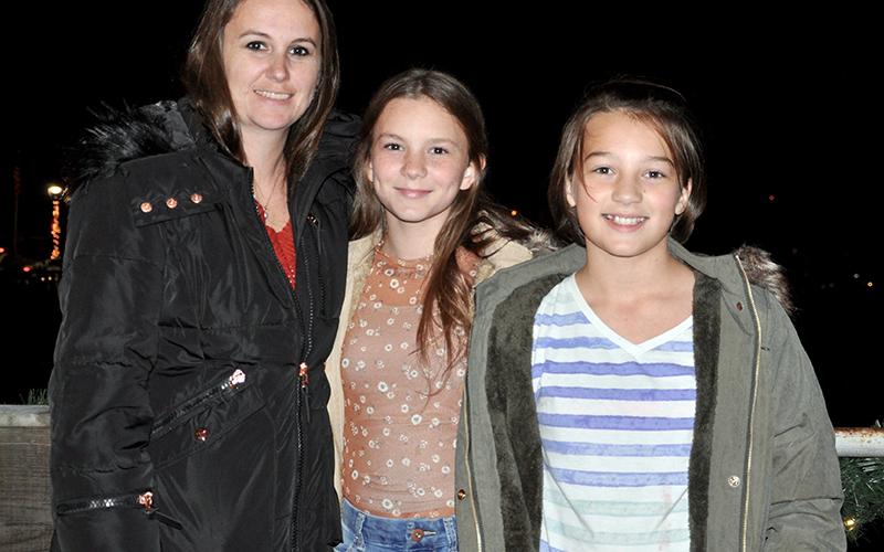 Christy, Sarrah and Bella found a spot along the old, steel bridge in McCaysville to watch the tree lighting Friday, November 27.