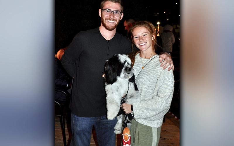 Troy, Raquel and little Oreo Galinski anticipate the tree lighting during Light Up McCaysville Friday, November 27.