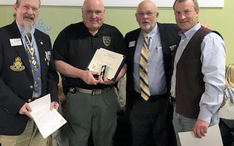 The Blue Ridge Mountains Chapter of the Sons of the American Revolution awarded a medal Sergeant J.K. Davenport of the Fannin County Sheriff’s Office.    Shown are, from left,  SAR Vice President Sid Turner, Davenport, SAR President Jared Ogden and Fannin County Sheriff Dane Kirby.