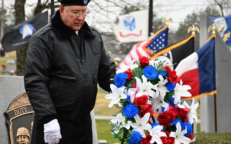 North Georgia Honor Guard member Bob Herrington posted the red, white and blue wreath during the honor guard’s Pearl Harbor Day Ceremony Monday, December 7.