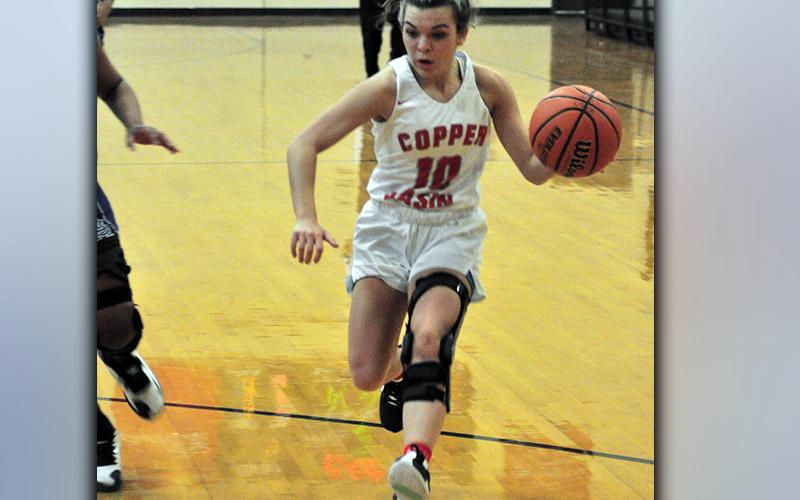 Lady Cougar Sydney Hickey drives to the basket in recent action for Copper Basin.