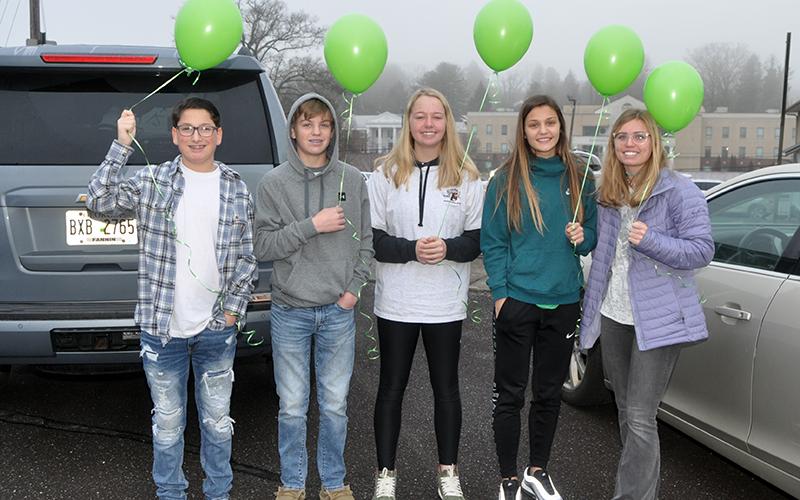 Many friends and family gathered in the parking lot of Blue Ridge First Baptist Church Friday, January 22, to celebrate the life of Sydnie Jones with a balloon release. Shown before the ceremony are, from left, Nicholas Honeycutt, Lawson Sullivan, Annabel Lillard, Becca Ledford and Kinsley Sullivan.