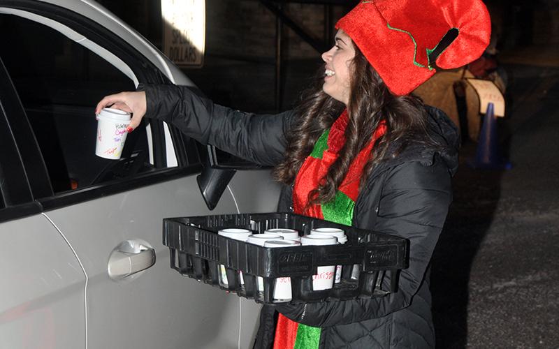 Hannah Fortenberry passed out hot chocolate to people that came to see Santa Claus at the Fannin Recreation Department.