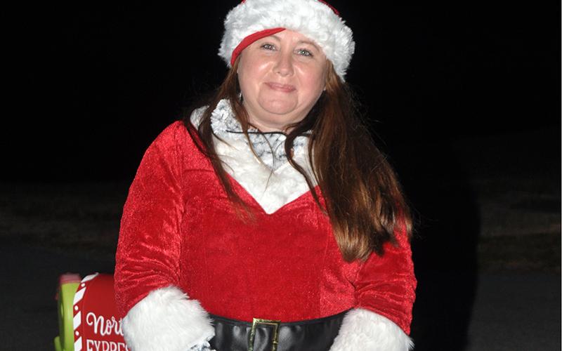 Santa’s helper Crystal Hughes was ready at her post to direct traffic at the Santa drive-thru event at the Fannin County Recreation Center Wednesday, December 23.