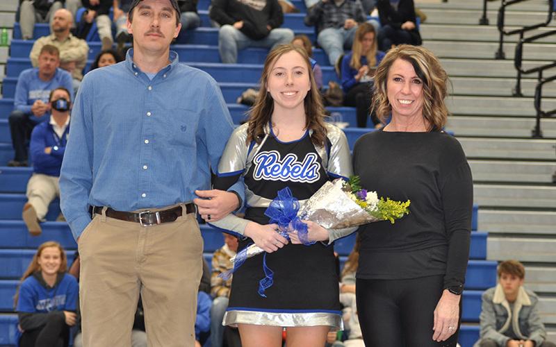 Fannin County honored their basketball and cheerleading seniors Friday, January 15. Senior cheerleader Shelby Belt is shown with her parents Greg and Shuana Belt.