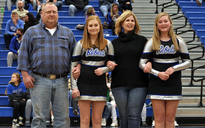 Fannin County High School senior cheerleader Courtney Tamberino was one of 15 cheer and basketball seniors honored at the senior night ceremony Friday, January 15. Shown during the ceremony are, from left, father, Chip Tamberino; Tamberino; mother, Ashley Tamberino; and sister, Katherine Tamberino.