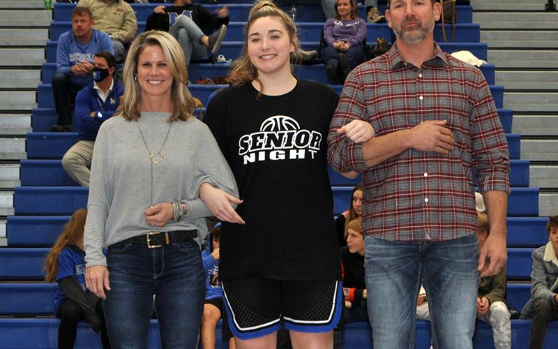 Fannin County honored their basketball seniors Friday, January 15. Senior Paige Foresman is shown with her parents, Heather and Chris Foresman.