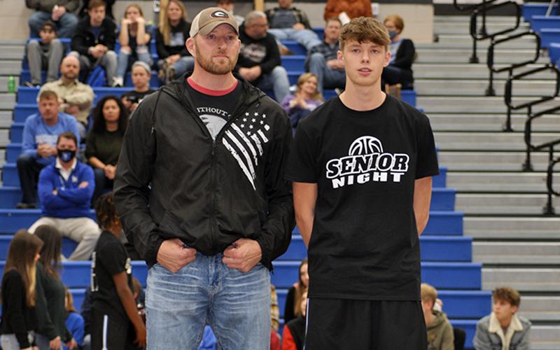Fannin County honored their basketball seniors Friday, January 15, in between games against Model. Senior Kaeden Twiggs is shown with his father, Josh Twiggs.