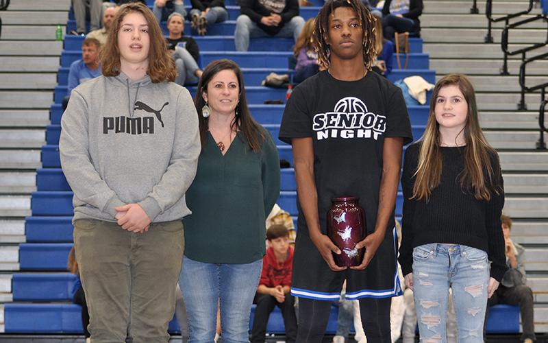 Fannin County High School senior Andre Bivens was one of 15 seniors honored at the senior night ceremony Friday, January 15. Shown during the ceremony are, from left, Chaz Padrutt, Joci Padruttm, senior Andre Bivens honoring his mother Sandra Williams, and Danica Padrutt.