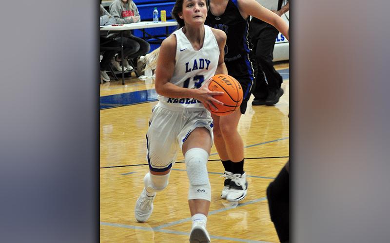 Lady Rebel Becca Ledford drives to the basket in recent action for the Fannin County basketball team.