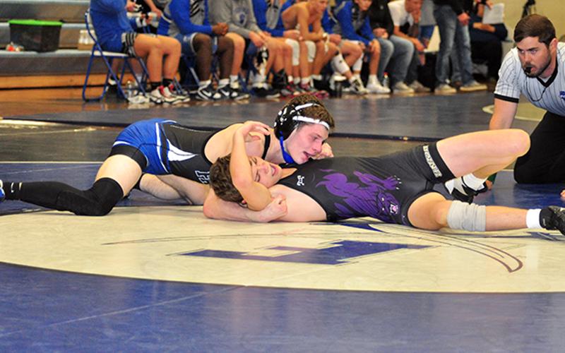 Kolton Stephens works his opponent during the Rebels wrestling team’s win against Union County Friday, January 15.
