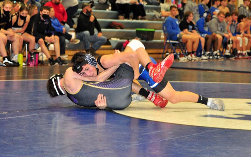 Zechariah Prater works his opponent during the Rebels Area Duals Friday, January 15. The Rebels finished as runner up in the contest.