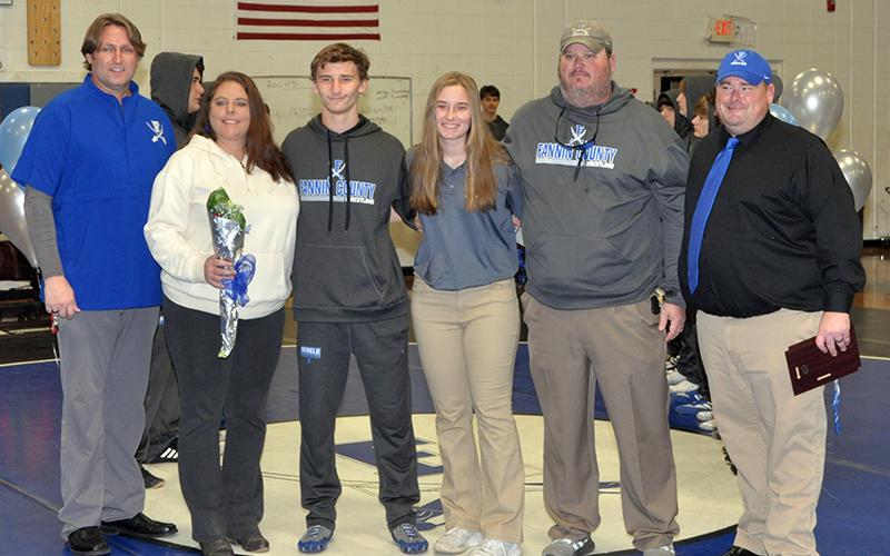 Senior wrestler McCay Turner and senior athletic trainer Lyndsay Turner were both honored Friday, January 15, at Fannin County High School’s wrestling senior night. Shown during the ceremony are, from left, Coach Alan Collis, mother Lynn Turner, McCay Turner, Lyndsay Turner, father, Adam Turner, and Coach Chuck Patterson.
