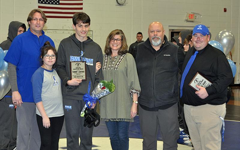 FCHS senior Tommy Ledford was honored during Fannin’s senior night for the wrestling team Friday, January 15. Shown during the ceremony are, from left, Coach Alan Collis, sister, Tatum Ledford, Ledford, mother, Trish Ledford, father, Keith Ledford, and Coach Chuck Patterson.