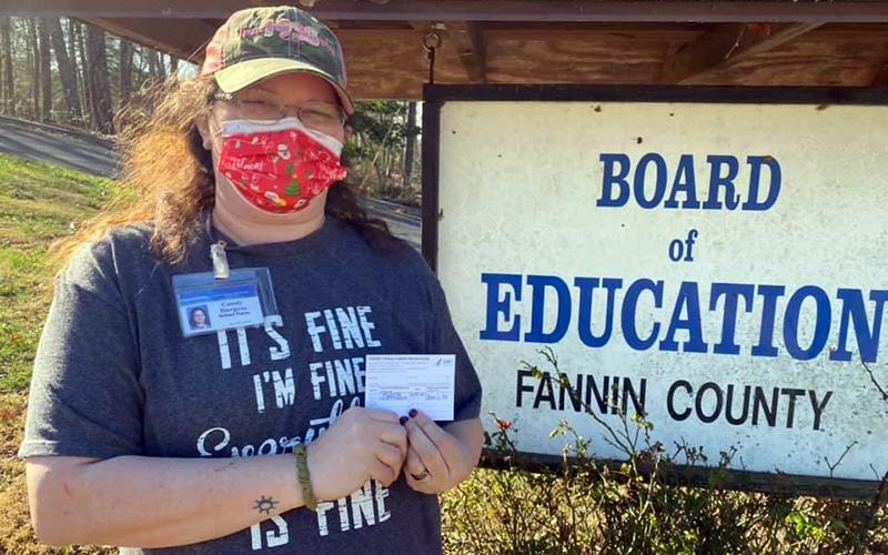 West Fannin Elementary School Nurse Candy Burgess received her initial dose of the Moderna COVID-19 Wednesday, December 23.