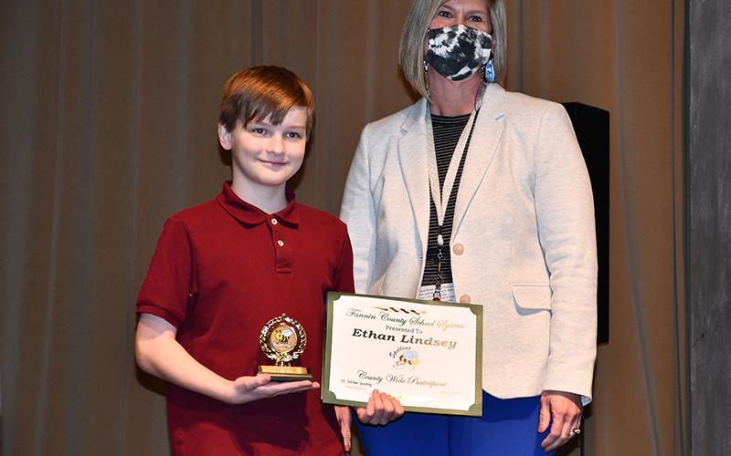Blue Ridge Elementary School student Ethan Lindsey represented his school in the Fannin County School System District Spelling Bee Thursday, January 14, after winning his school bee. He is shown with his principal, Dr. April Hodges.