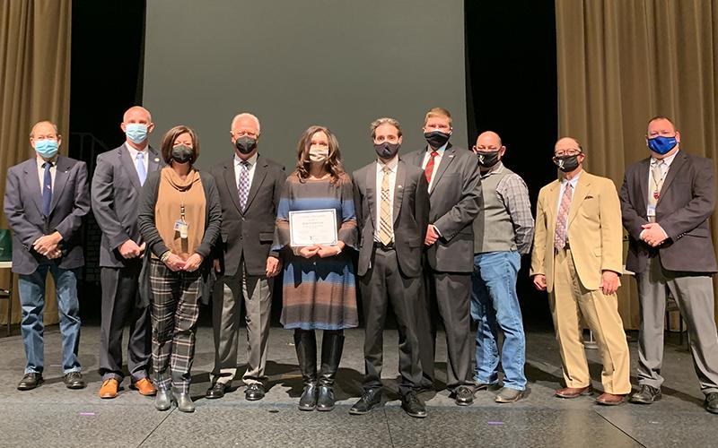 The Fannin County Board of Education recognized West Fannin Elementary School STEM teacher Kim Patterson as a Georgia Youth Science &amp; Technology Centers 2021 Georgia STEM Scholar Award recipient Thursday, January 14. Shown are, from left, board members Lewis DeWeese, board Chair Chad Galloway, Principal Alison Danner, board Vice-Chair Terry Bramlett, Patterson, Director of Applied &amp; Integrated Instruction and CTAE Director &amp; STEM/STEAM Coordinator Lucas Roof, Superintendent Dr. Michael Gwatney, board member