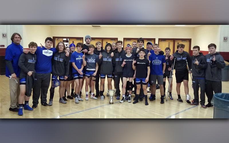 The Fannin County Rebel wrestling team competed in the Lambert High School Hookem Holiday Clash Tuesday, December 29. Shown are, from left, Coach Alan Collis, Bryson Bradburn, Logan long, Taylor Collis, Chelsey Frye, Colby Shaw, Cooper Moreland, Mason Bundy, Drake Cantrell, Jackson Mercer, Corbin Davenport, Levi Cochran, McCay Turner, Blake Summers, Tristan Siler, Tommy Ledford, Zechariah Prater, Coach Chuck Patterson, Carson Collis, Kolton Stephens, Matthew Crowder, Caleb McTaggart and Christen Newberry.