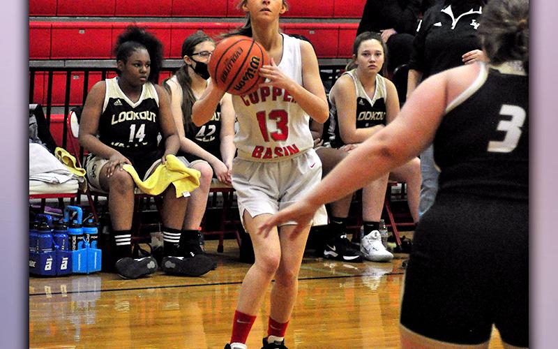 Lady Cougar Gracie Smith sets her feet and shoots a jumpshot during the Lady Cougars district playoff win against Lookout Valley Thursday, February 18.
