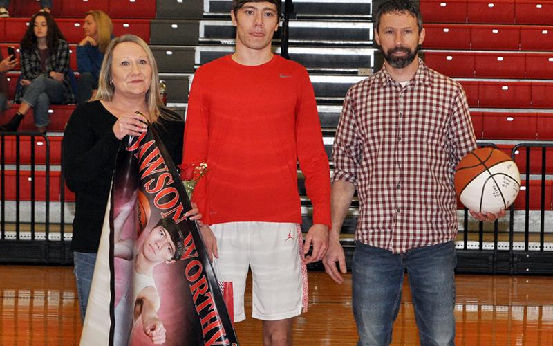 Copper Basin held their senior night ceremony for basketball and cheerleading seniors Saturday, February 6. Shown during the ceremony are, from left, grandmother, Kay Jabaley; father, Tim Jabaley; senior, Timothy Jabaley; and mother, Eden Jabaley.
