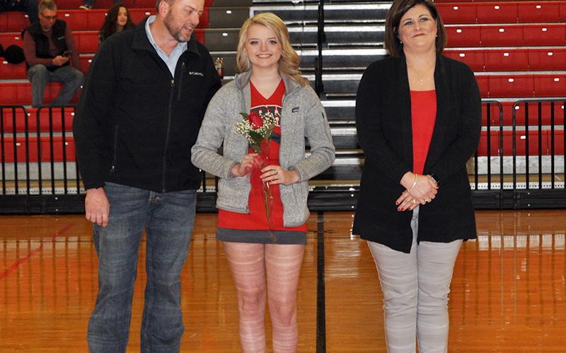 Haley Harper was honored along with 10 other basketball and cheerleading seniors at Copper Basin’s senior night ceremony Saturday, February 6. Harper is shown with her parents, Chris and Brandy Harper.