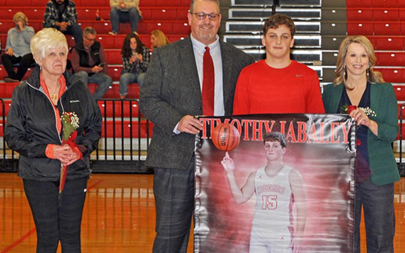 Dawson Worthy was one of 11 basketball and cheerleading seniors honored at Copper Basin’s senior night ceremony Saturday, February 6. Worthy is shown with his parents Tim and Alicia  Worthy.