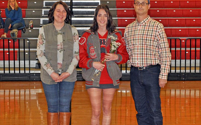 Rebecca O’Neal was one of the 11 basketball and cheerleading seniors honored at Copper Basin’s senior night ceremony Saturday, February 6. O’Neal is shown during the ceremony with her parents, Craig and Crystal O’Neal.