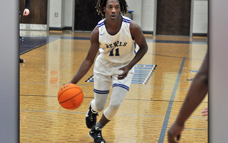 Andre Bivens attacks the basket in recent action for the Fannin County Rebels.